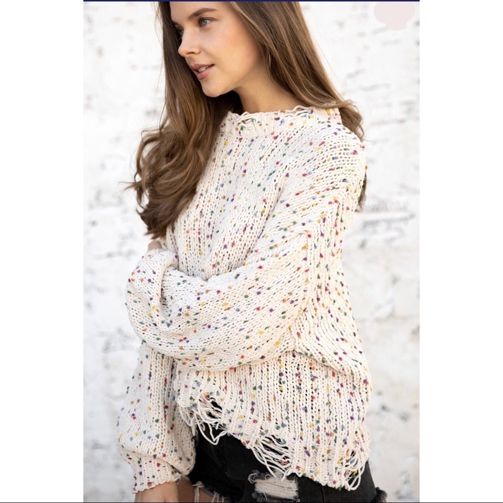 Knitted sweater with distressed Hem details - Picture 1 of 8